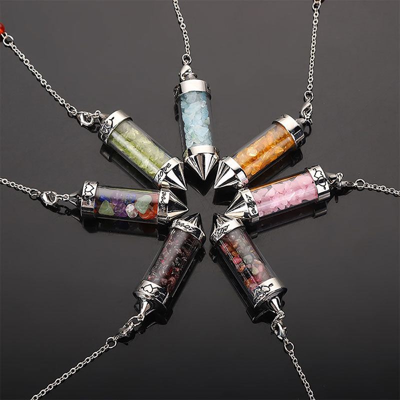 Péndulo de meditación de cristal de colores para los chakras