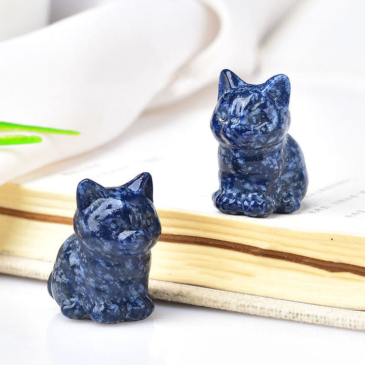 Artesanías con talladas de piedras preciosas y gatitos de cristal de Olivenorma.