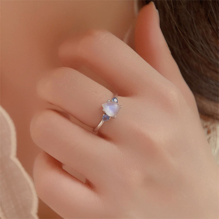 Anillo de plata de ley S925 con topacio azul y piedra lunar de Olivenorma