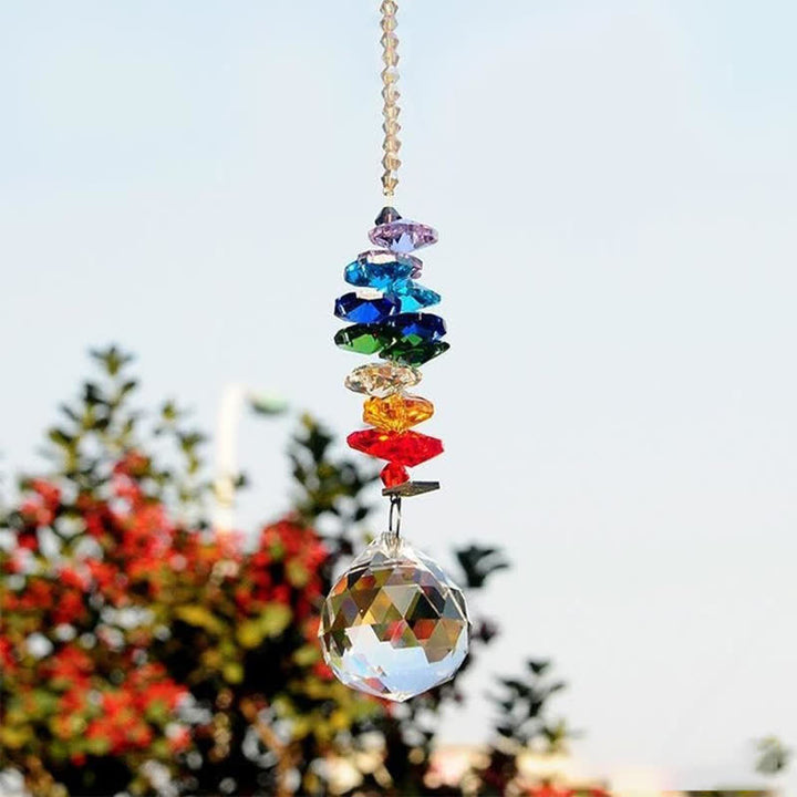 Adorno de piedra preciosa con forma de planeta meteorito y atrapasoles de cristal.