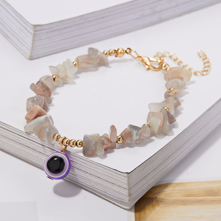 Pulsera con colgante de ojo malvado de grava de cristal natural de Olivenorma