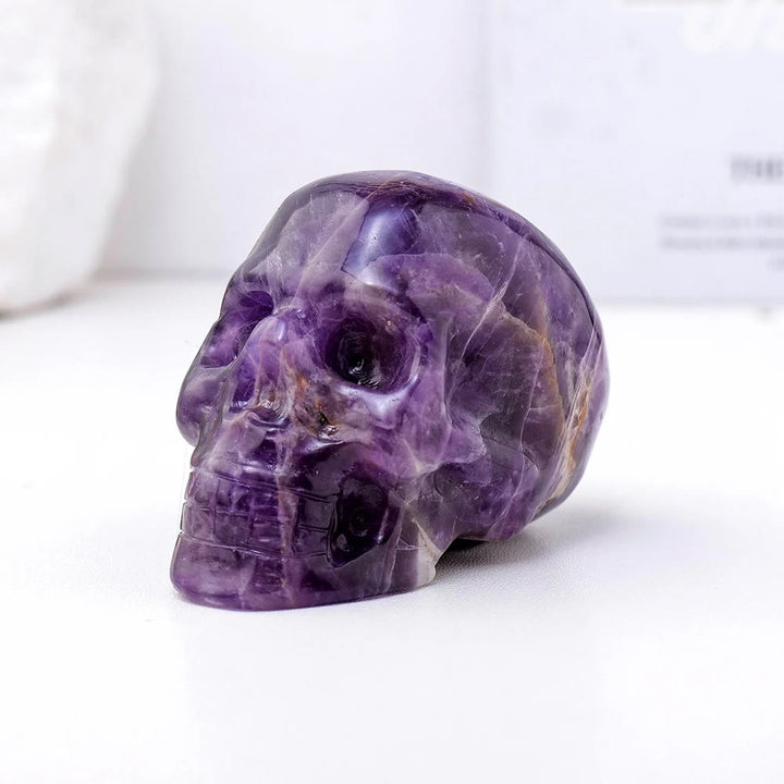 Estatua de calavera de amatista de 3 pulgadas de Olivenorma, piedra preciosa curativa decorativa 
