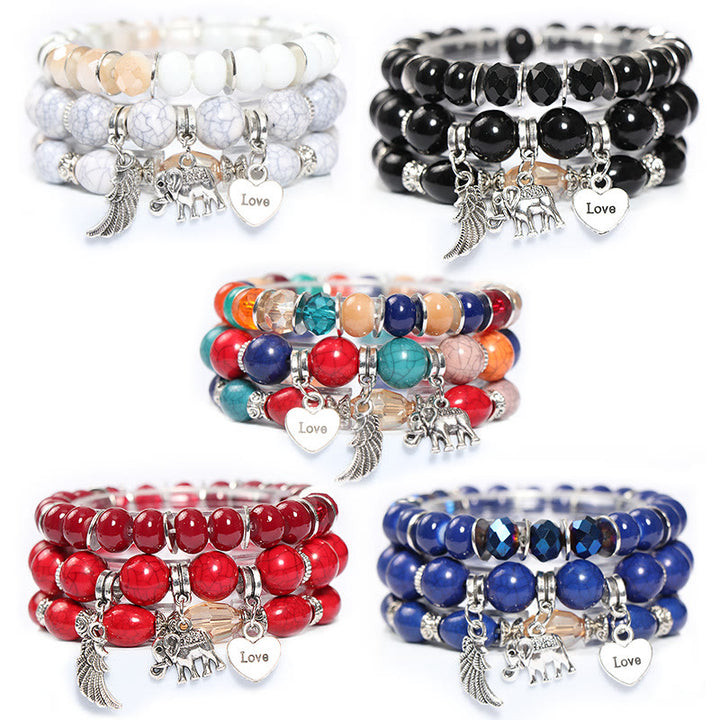 Juego de pulseras con cuentas y colgante de corazón con alas de elefante de Olivenorma 