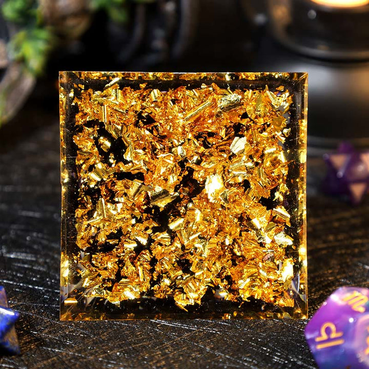 Pirámide de orgón de obsidiana con bola de amatista y grava de Olivenorma 
