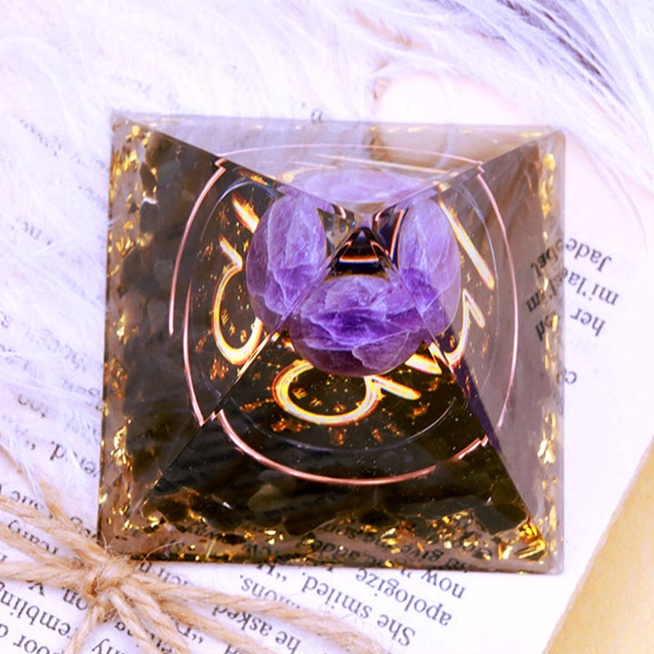 Pirámide de orgón del zodiaco Libra con esfera de amatista y obsidiana de Olivenorma 
