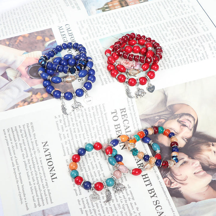 Juego de pulseras con cuentas y colgante de corazón con alas de elefante de Olivenorma 