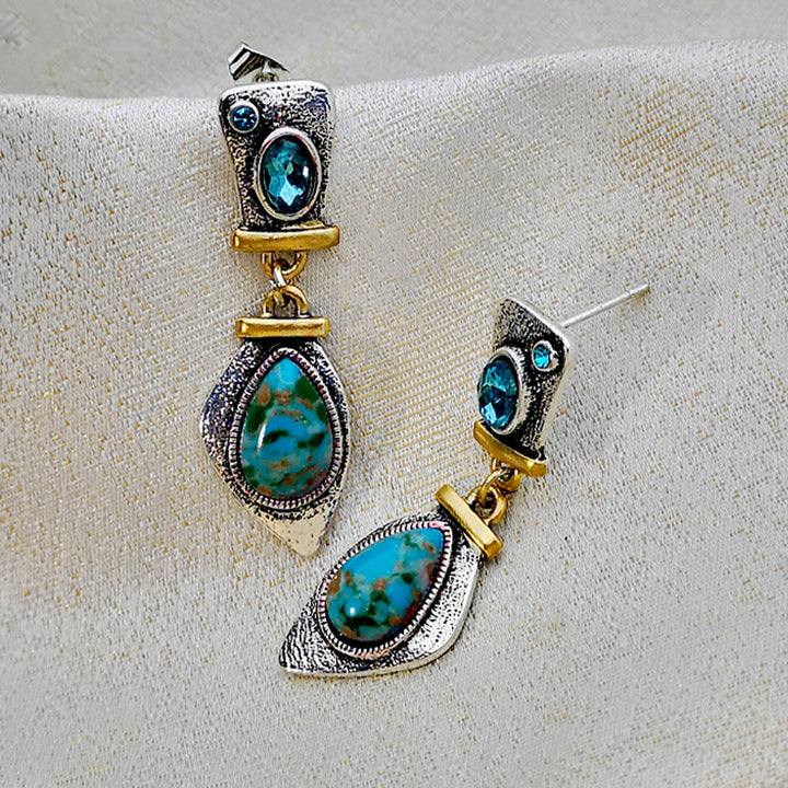 Pendientes de plata con topacio azul y piedra emperadora de Olivenorma