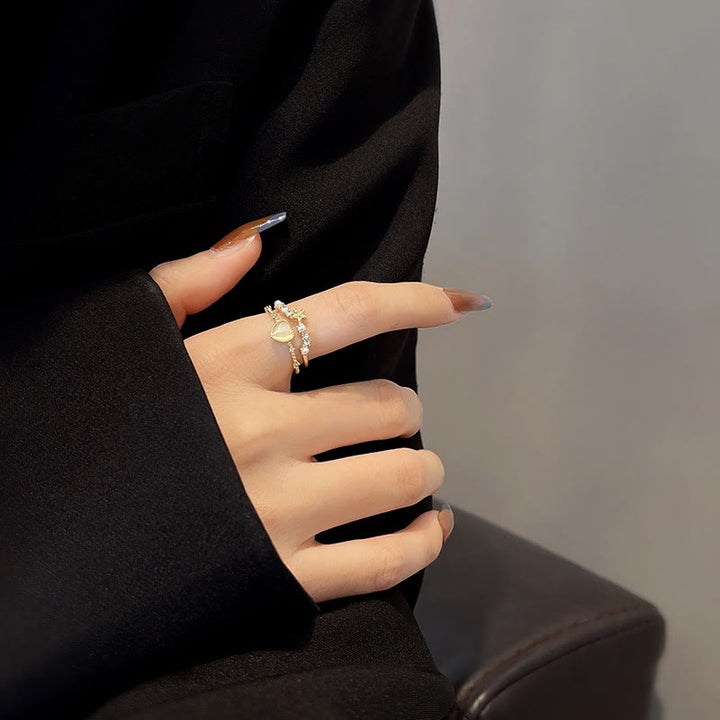 Anillo ajustable con piedra de ojo de gato y circonita blanca de Olivenorma 