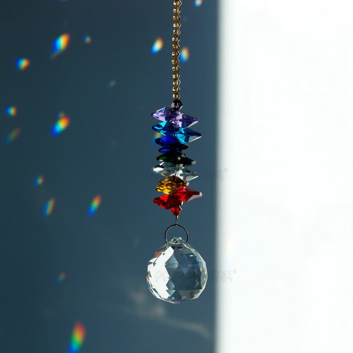Adorno de piedra preciosa con forma de planeta meteorito y atrapasoles de cristal.