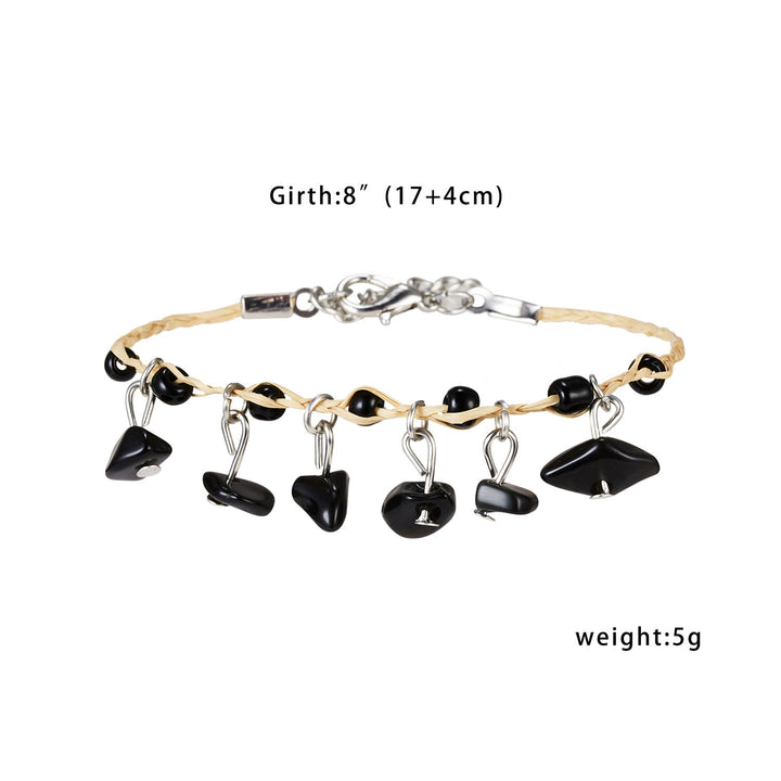 Pulsera trenzada con borlas de obsidiana, ojo de tigre y amatista de Olivenorma