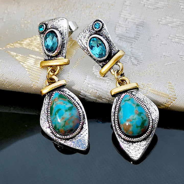 Pendientes de plata con topacio azul y piedra emperadora de Olivenorma