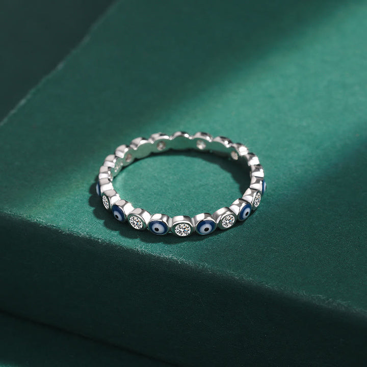 Anillo de plata de ley S925 con circonitas redondas y ojo malvado blanco de Olivenorma