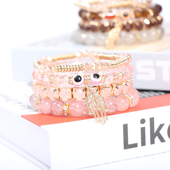 Juego de pulseras de cuentas de cuatro capas con ojo turco y hamsa de Olivenorma 