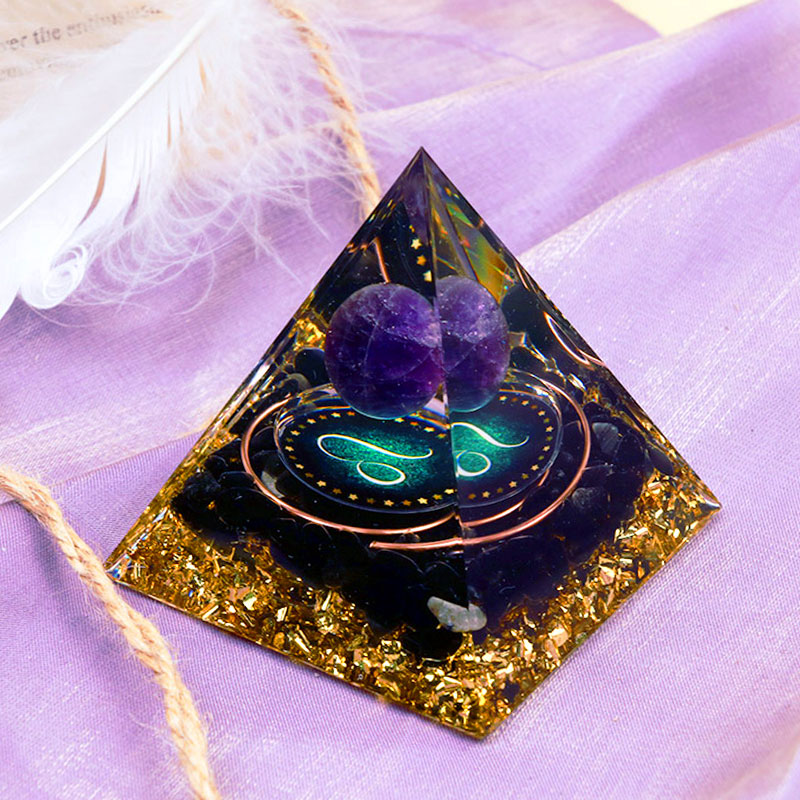 Pirámide de orgón del zodiaco Leo con esfera de amatista y obsidiana de Olivenorma 