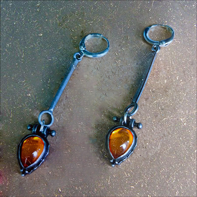Pendientes de piedra de ámbar con forma de gota de agua de la tribu Olivenorma