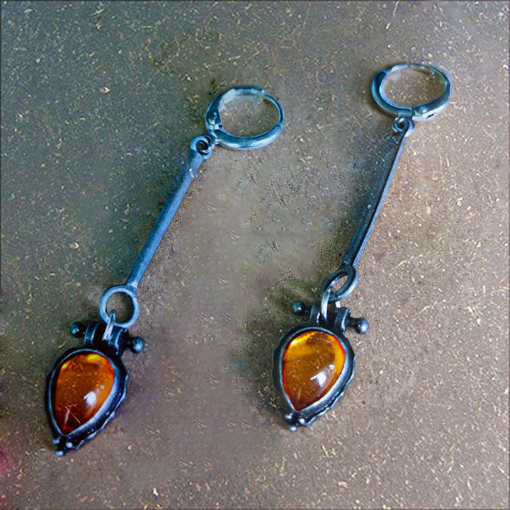 Pendientes de piedra de ámbar con forma de gota de agua de la tribu Olivenorma