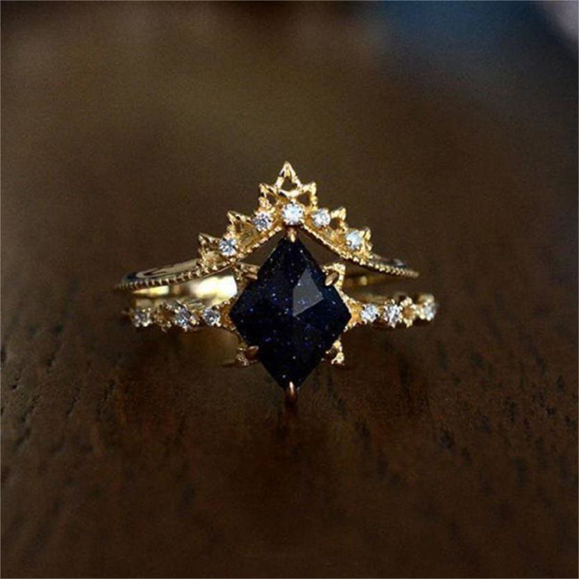 Anillo de corona de doble hilera de circonitas blancas y arenisca azul de Olivenorma