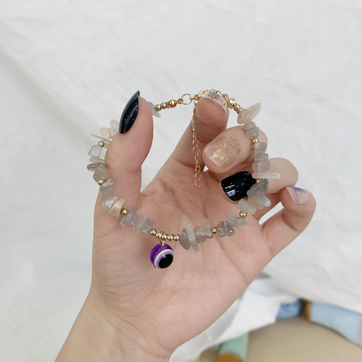 Pulsera con colgante de ojo malvado de grava de cristal natural de Olivenorma