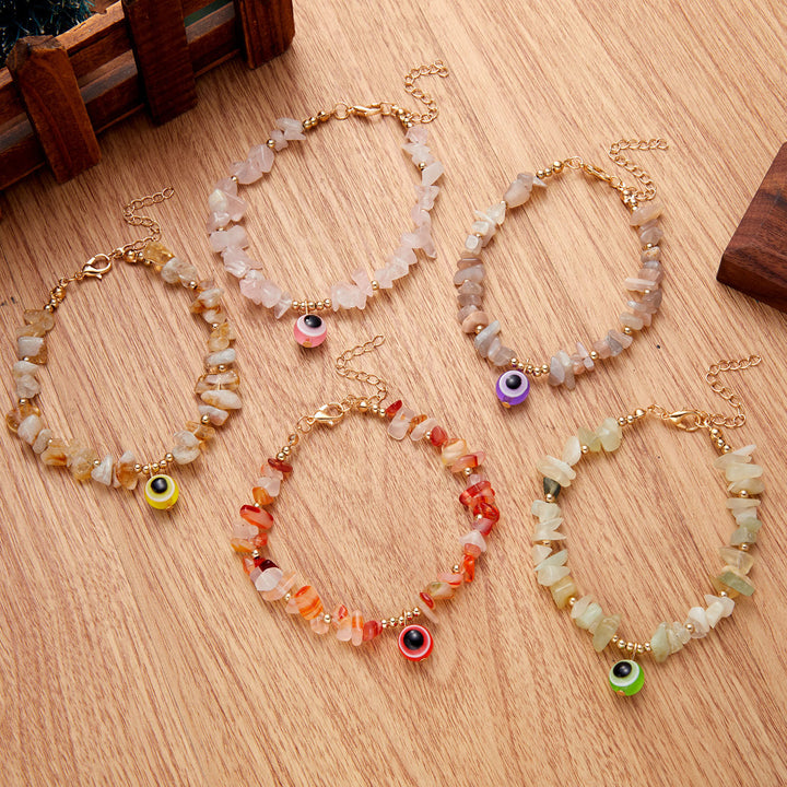 Pulsera con colgante de ojo malvado de grava de cristal natural de Olivenorma