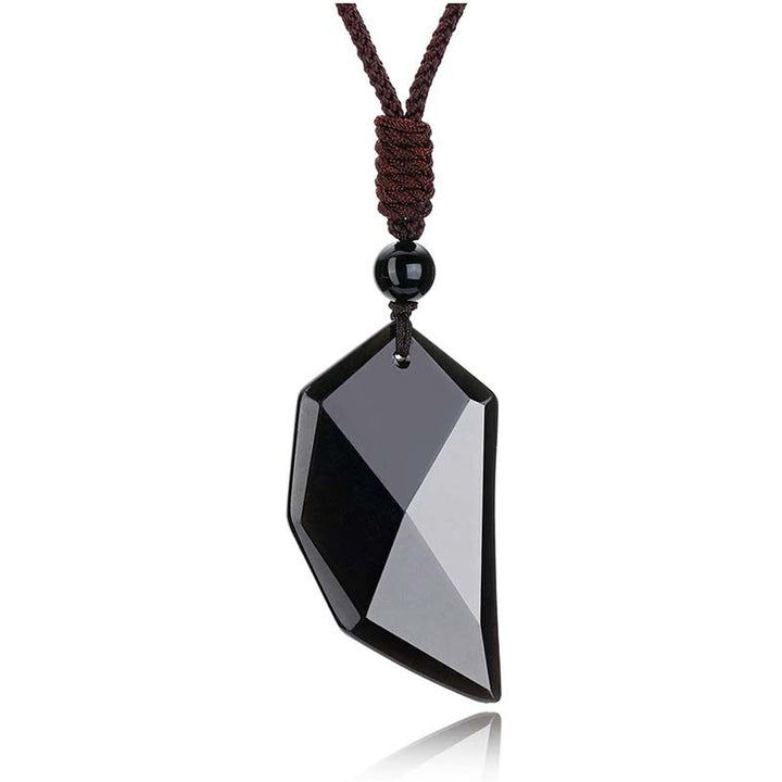 Collar con forma de corazón de cuarzo transparente y obsidiana de Olivenorma 