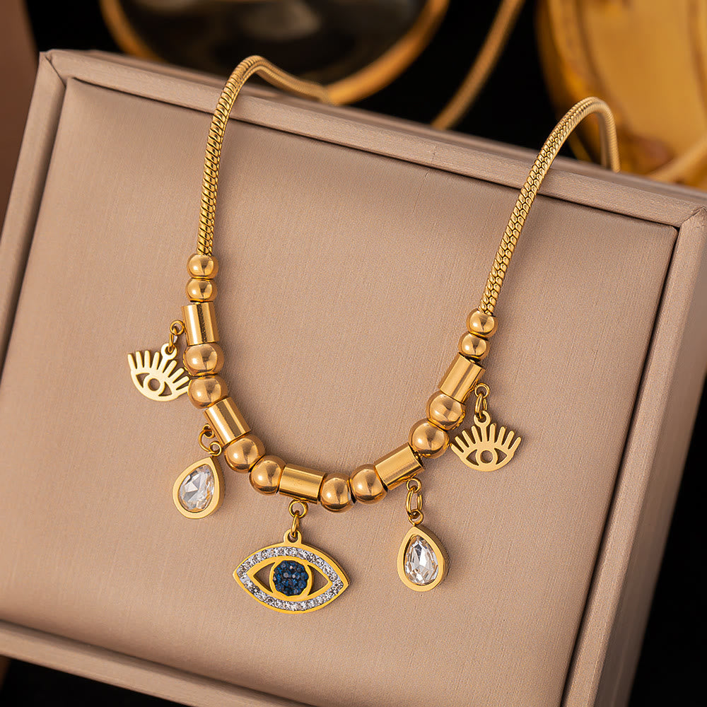 Pulsera envolvente con ojo malvado de turquesa dorada de Olivenorma