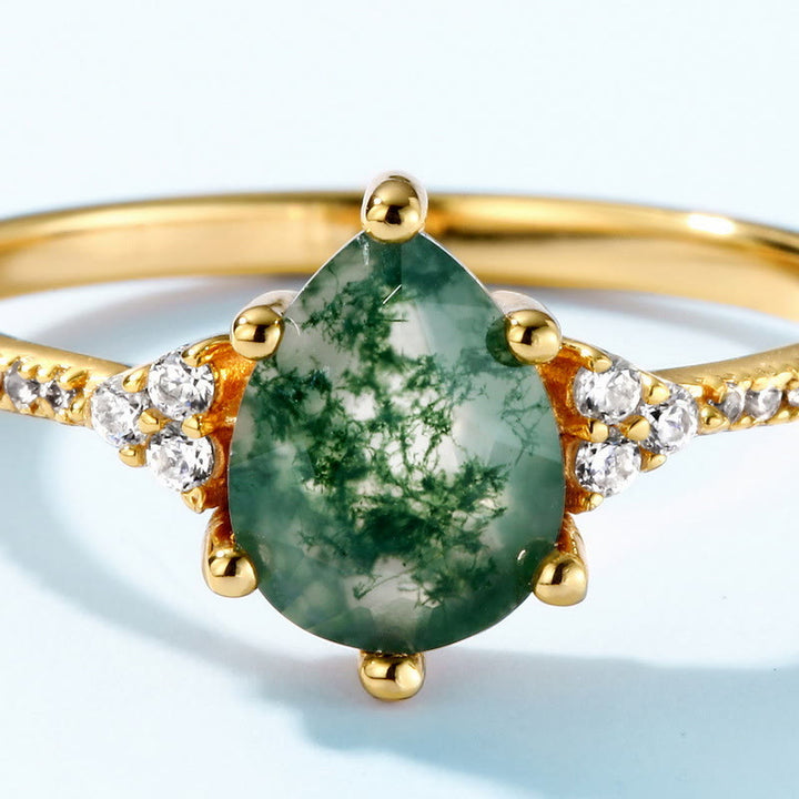 Anillo de seis garras con circonita blanca y ágata musgosa de Olivenorma