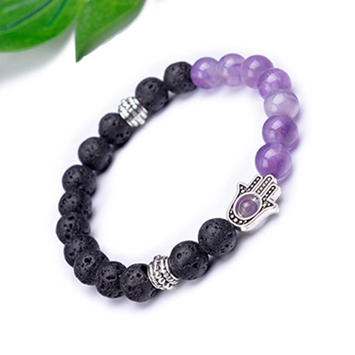 Pulsera con colgante de Hamsa y cuentas de piedra natural hecha a mano de Olivenorma