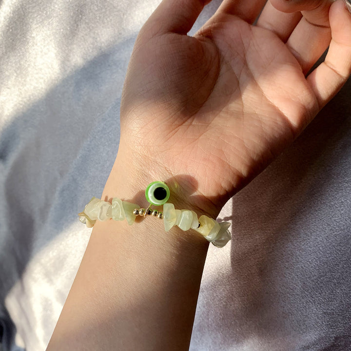 Pulsera con colgante de ojo malvado de grava de cristal natural de Olivenorma