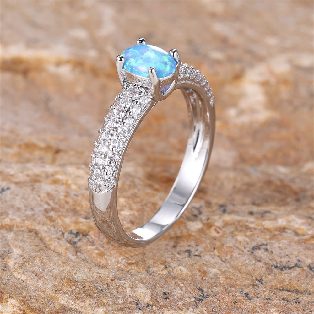 Anillo con borde de circonita y ópalo redondo "Shiny Elegance" de Olivenorma