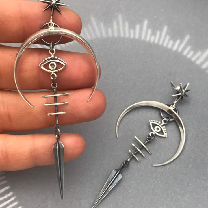 Pendientes de media luna con forma de ojo malvado de Olivenorma