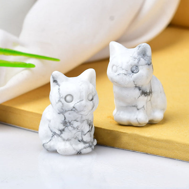 Artesanías con talladas de piedras preciosas y gatitos de cristal de Olivenorma.
