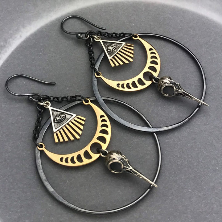 Pendientes de calavera de cuervo con fase lunar y ojo malvado de Olivenorma