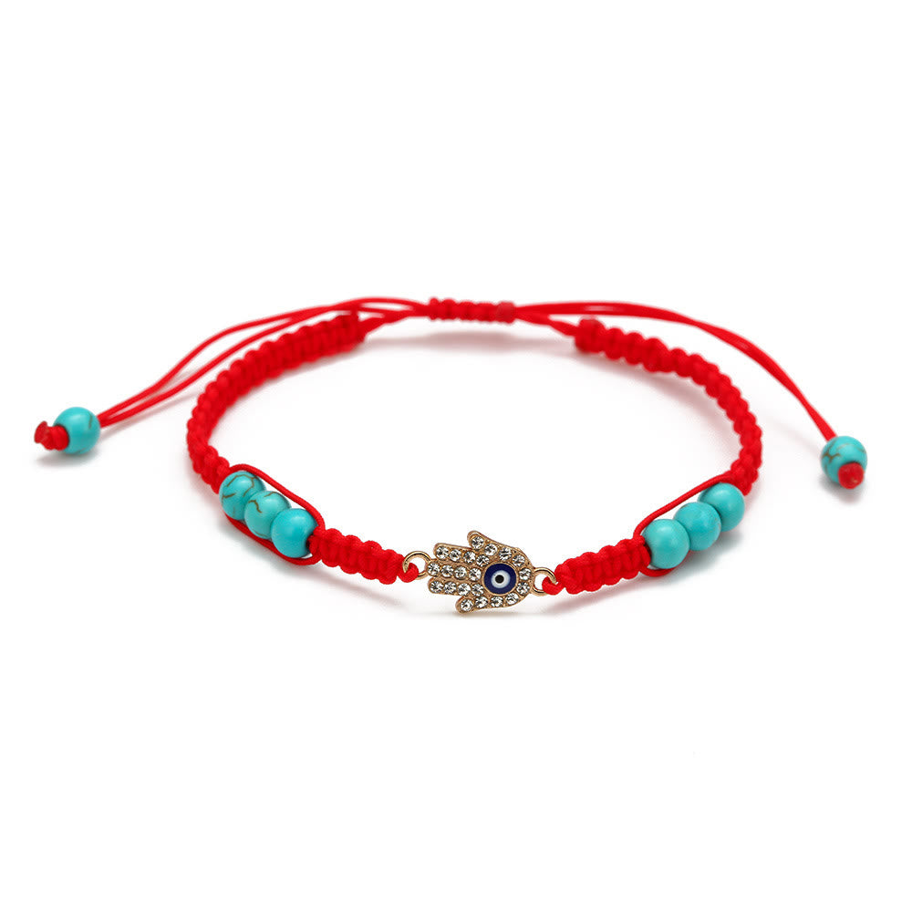 Pulsera trenzada ajustable con ojo malvado y circonita blanca y turquesa de Olivenorma 