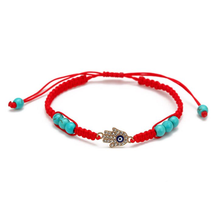 Pulsera trenzada ajustable con ojo malvado y circonita blanca y turquesa de Olivenorma 