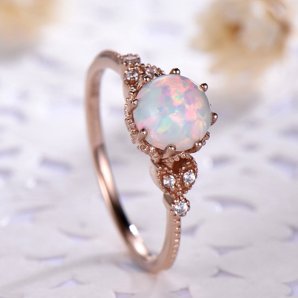 Anillo de piedra lunar redondo con ópalo y circonita blanca de Olivenorma 