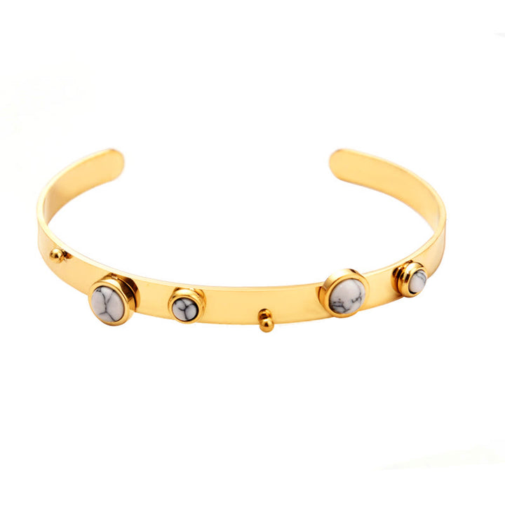Pulsera abierta de piedra natural estilo étnico bohemio de Olivenorma