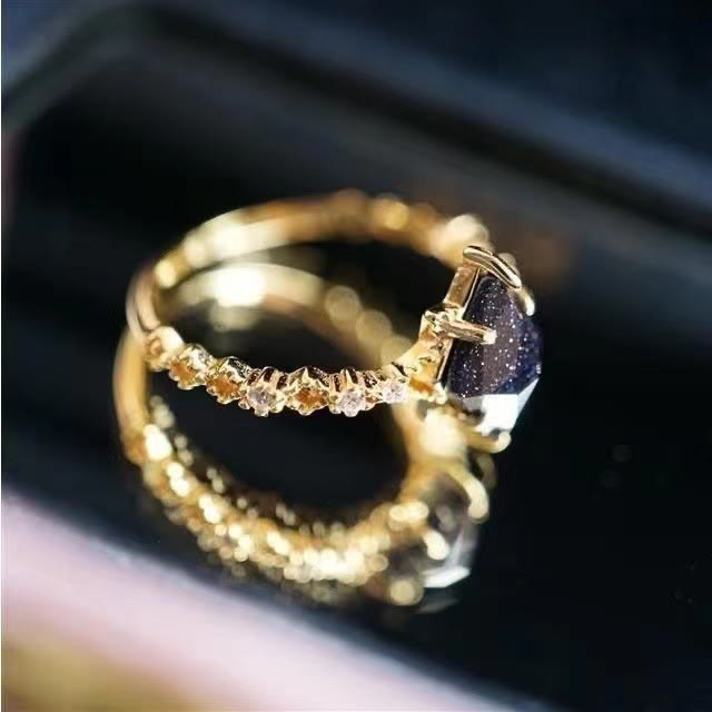 Anillo de corona de doble hilera de circonitas blancas y arenisca azul de Olivenorma
