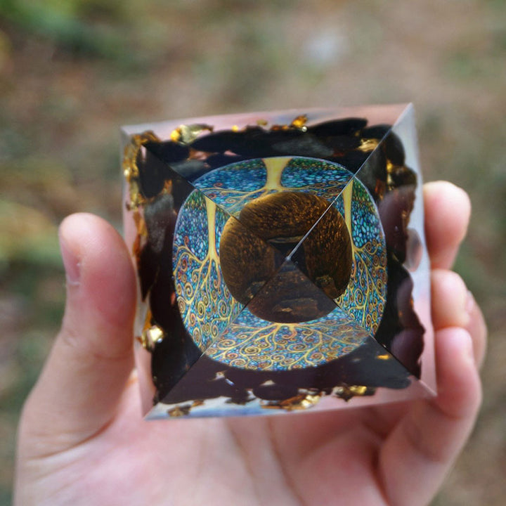 Esfera de ojo de tigre de Olivenorma y pirámide de orgón protectora de obsidiana 