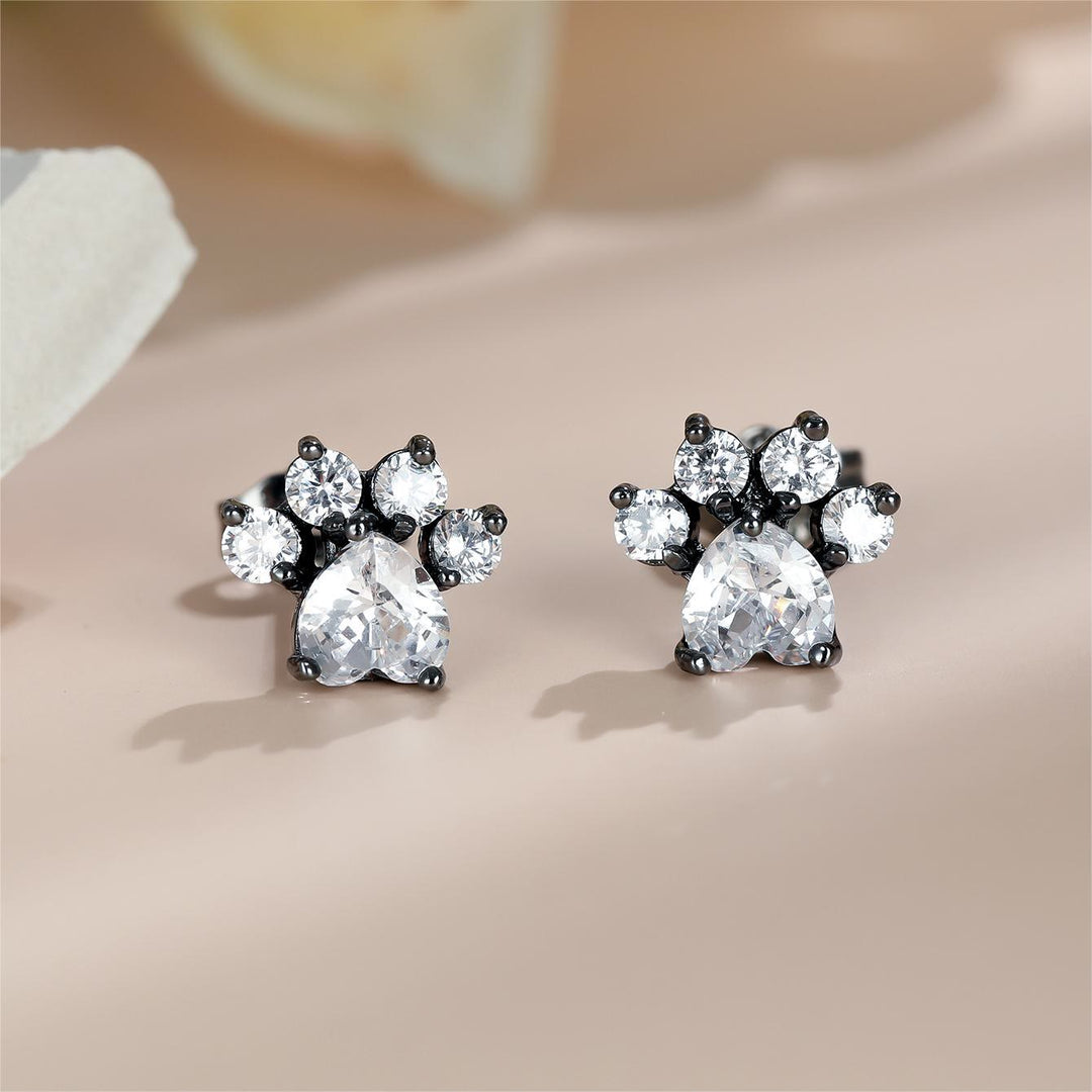 Pendientes de pata de gatito con circonita blanca y ópalo kawaii de Olivenorma