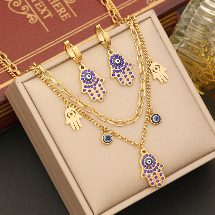 Conjunto de collar, pulsera y pendientes de resina epoxi con ojo de hamsa y mal de ojo de Olivenorma