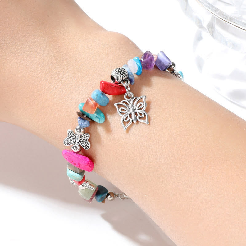 Pulsera con dije de mariposa de escombros de cristal colorido de Olivenorma