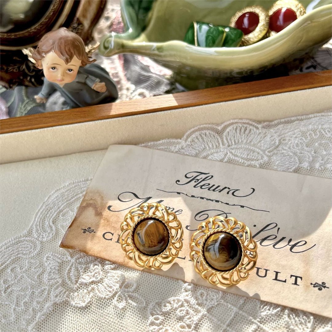 Pendientes de oro con girasol y ojo de tigre de Olivenorma
