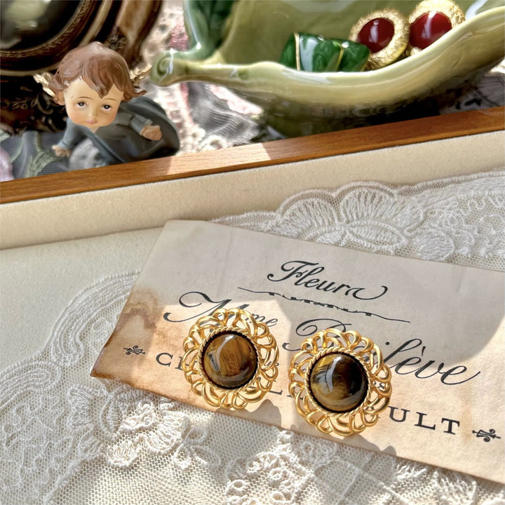 Pendientes de oro con girasol y ojo de tigre de Olivenorma