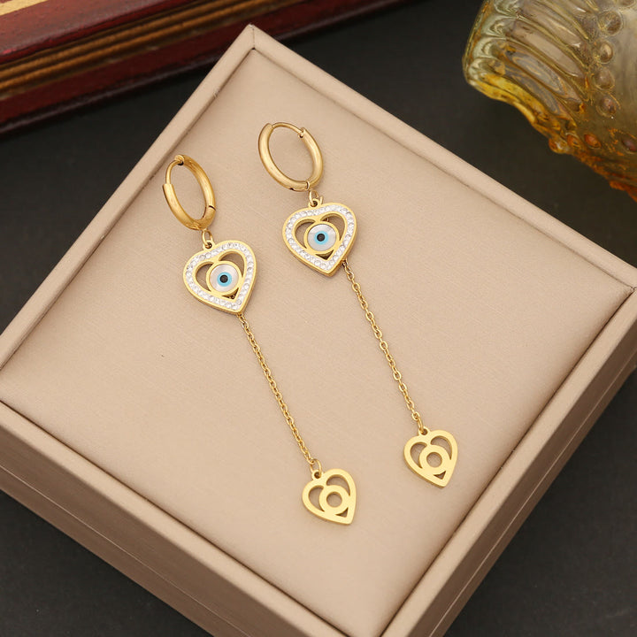 Pulsera, pendientes, collar y ojo malvado con circonitas y turquesa de Olivenorma 