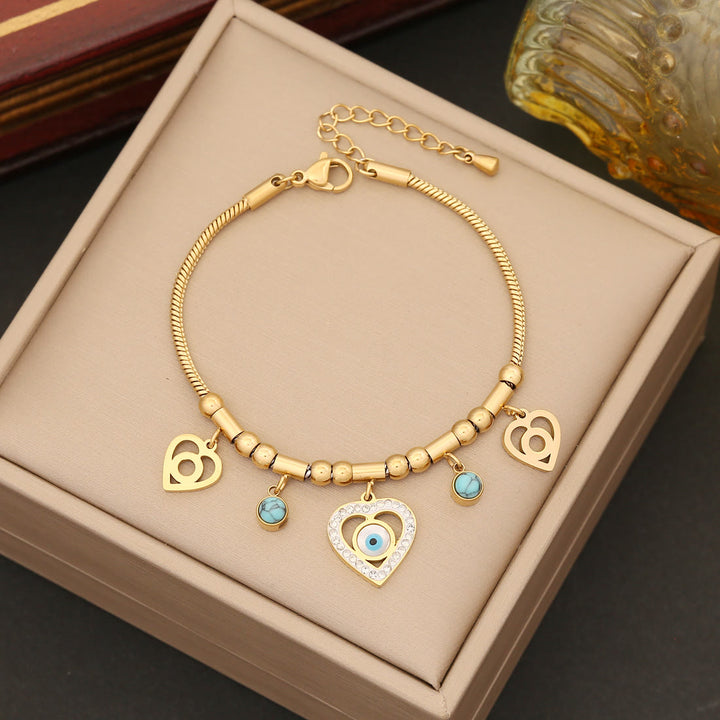 Pulsera, pendientes, collar y ojo malvado con circonitas y turquesa de Olivenorma 