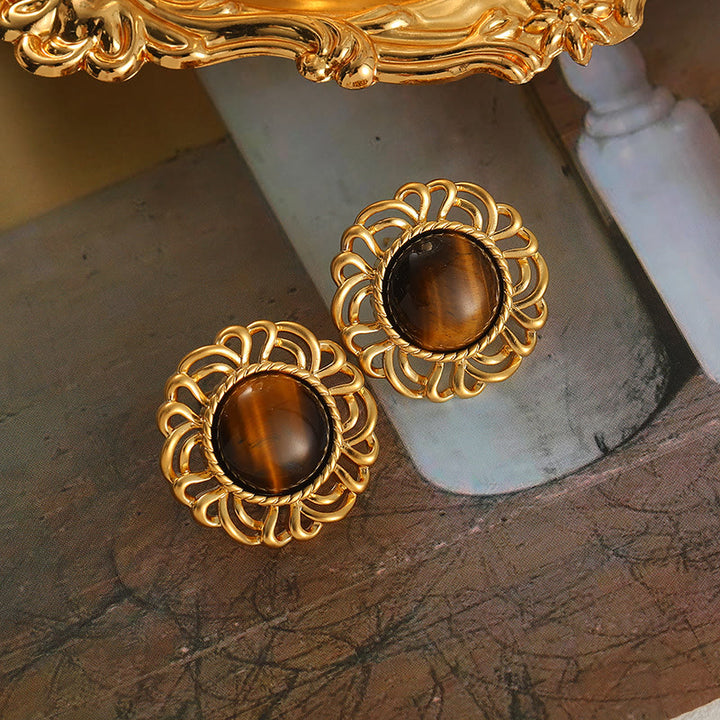 Pendientes de oro con girasol y ojo de tigre de Olivenorma