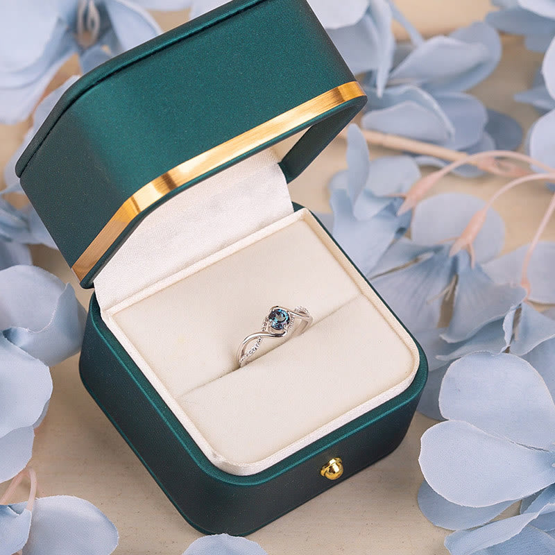 Anillo de compromiso de alejandrita azul en forma de onda de Olivenorma