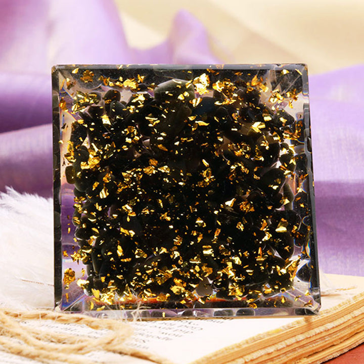 Pirámide de orgón del zodiaco Leo con esfera de amatista y obsidiana de Olivenorma 