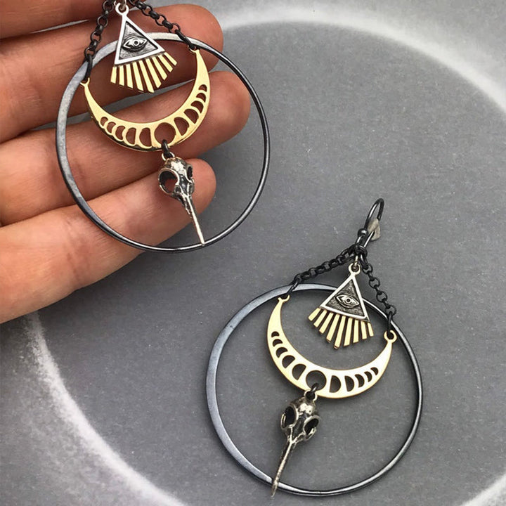 Pendientes de calavera de cuervo con fase lunar y ojo malvado de Olivenorma