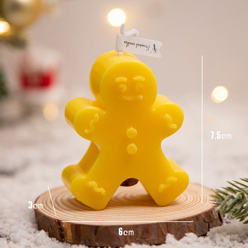 Vela perfumada con forma de hombrecito de jengibre y copos de nieve con atmósfera navideña de Olivenorma 